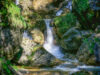 Wandern neben Wasserfällen in der Bärenschützklamm